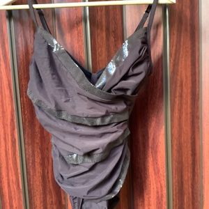 Dark brown one-piece swimsuit.